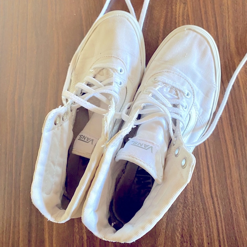 All white sk8 hi womens vans